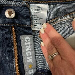 2 pairs of men’s jeans.
Cinch and ariat